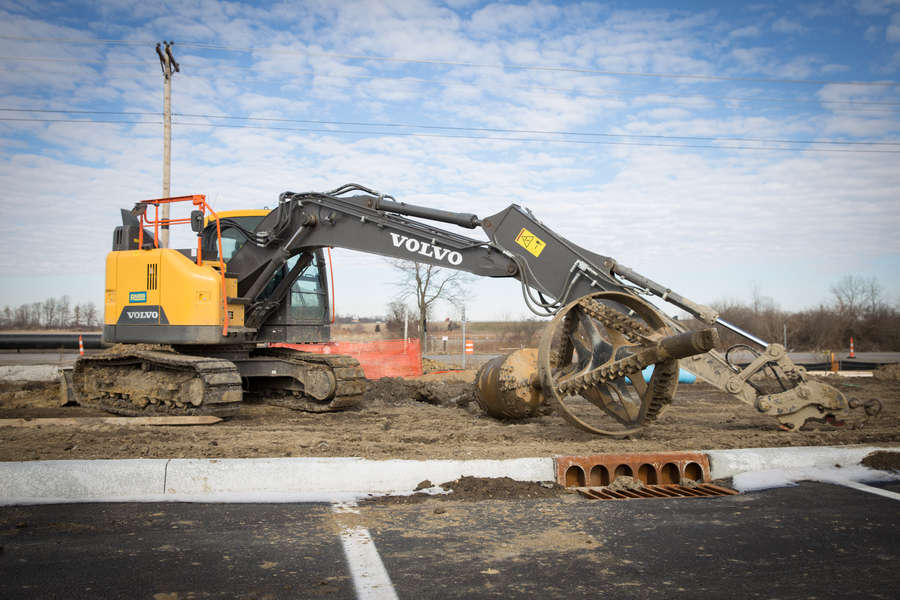 Excavator and drill bit